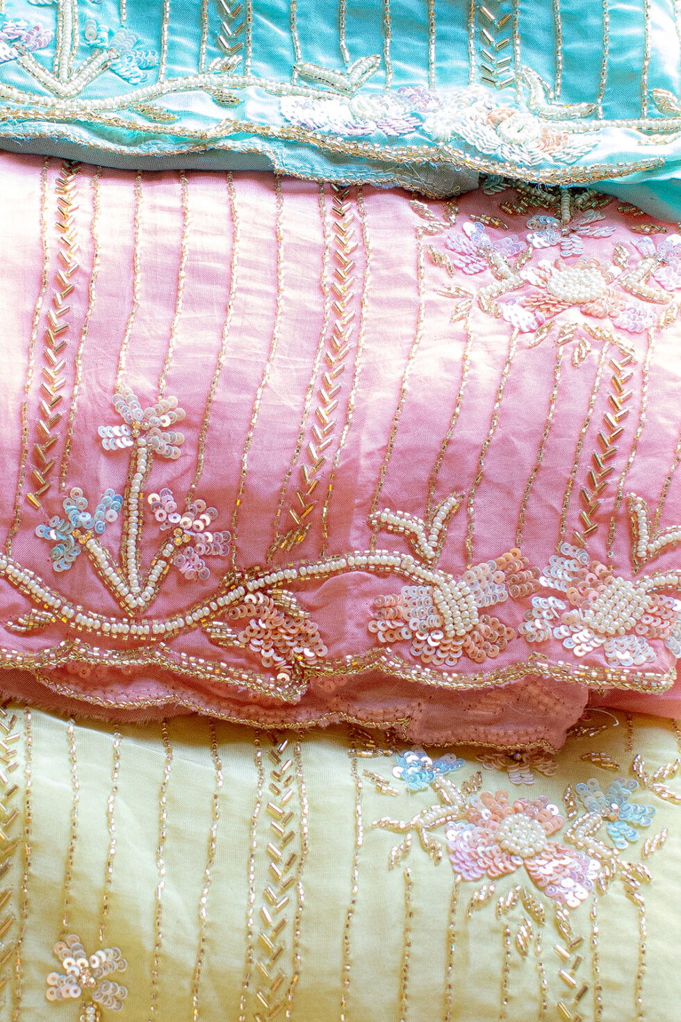 Cutdana embroidered materials in three colors.